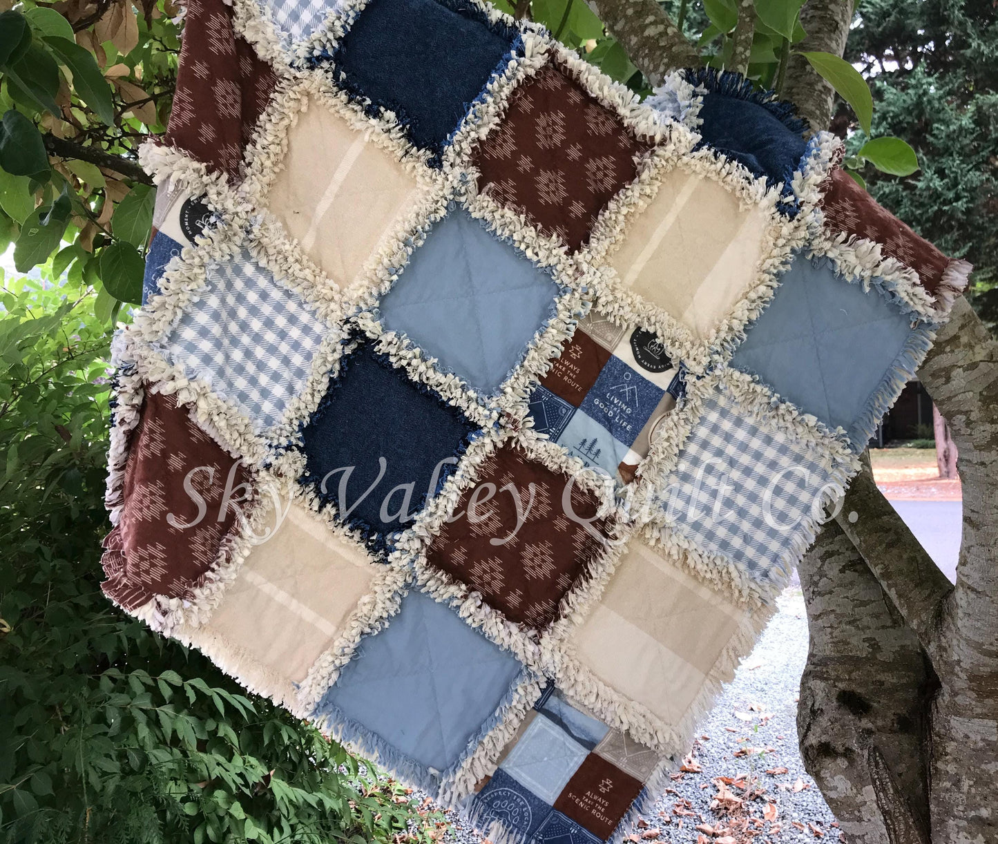 Finished rag quilt - mountains, southwestern, uplug, aztec, blues, rust and cream