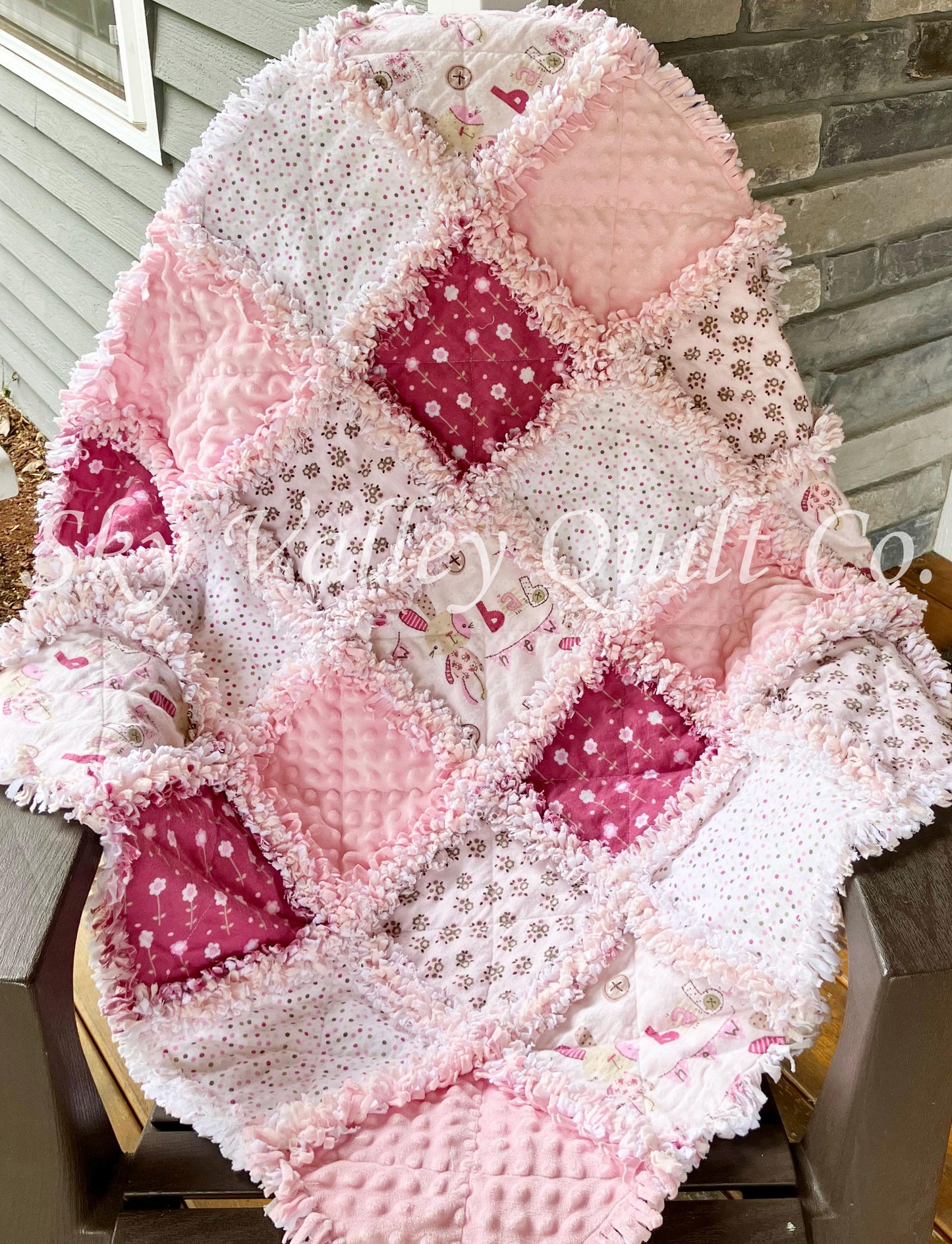 Finished rag quilt - rag bunnies in light pink and cranberry flannels