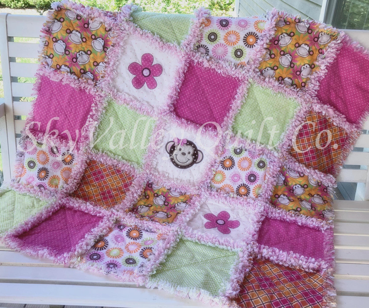 Finished and ready to ship rag quilt -pink and green monkey applique quilt