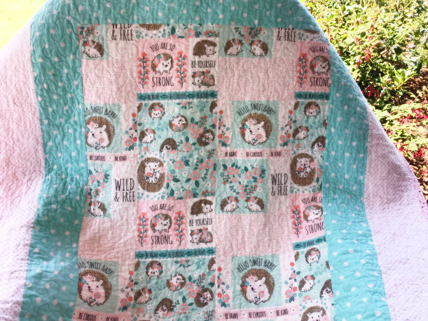 Finished and ready to ship Baby Quilt -hedgehog in pink and aqua flannel