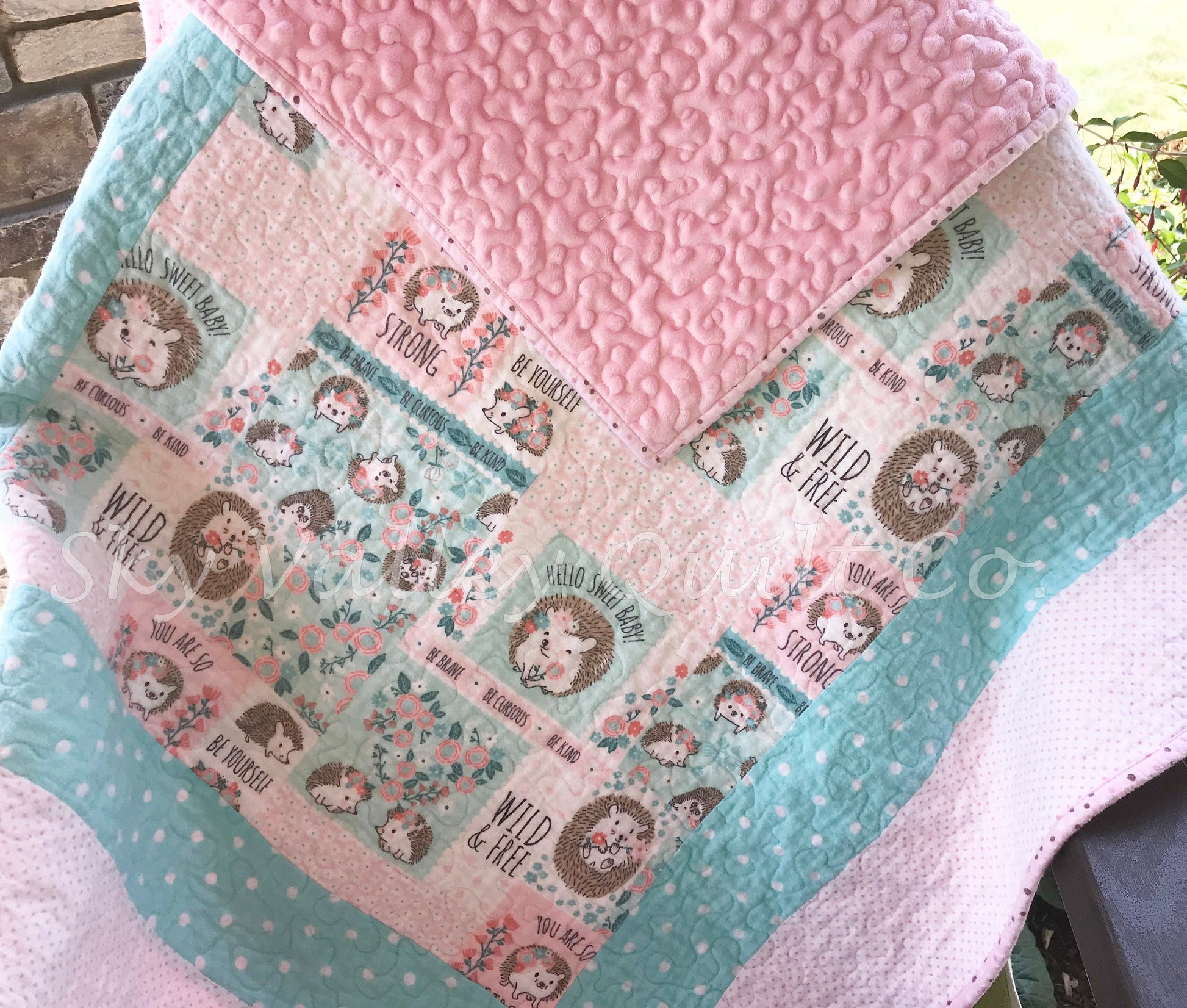 Finished and ready to ship Baby Quilt -hedgehog in pink and aqua flannel