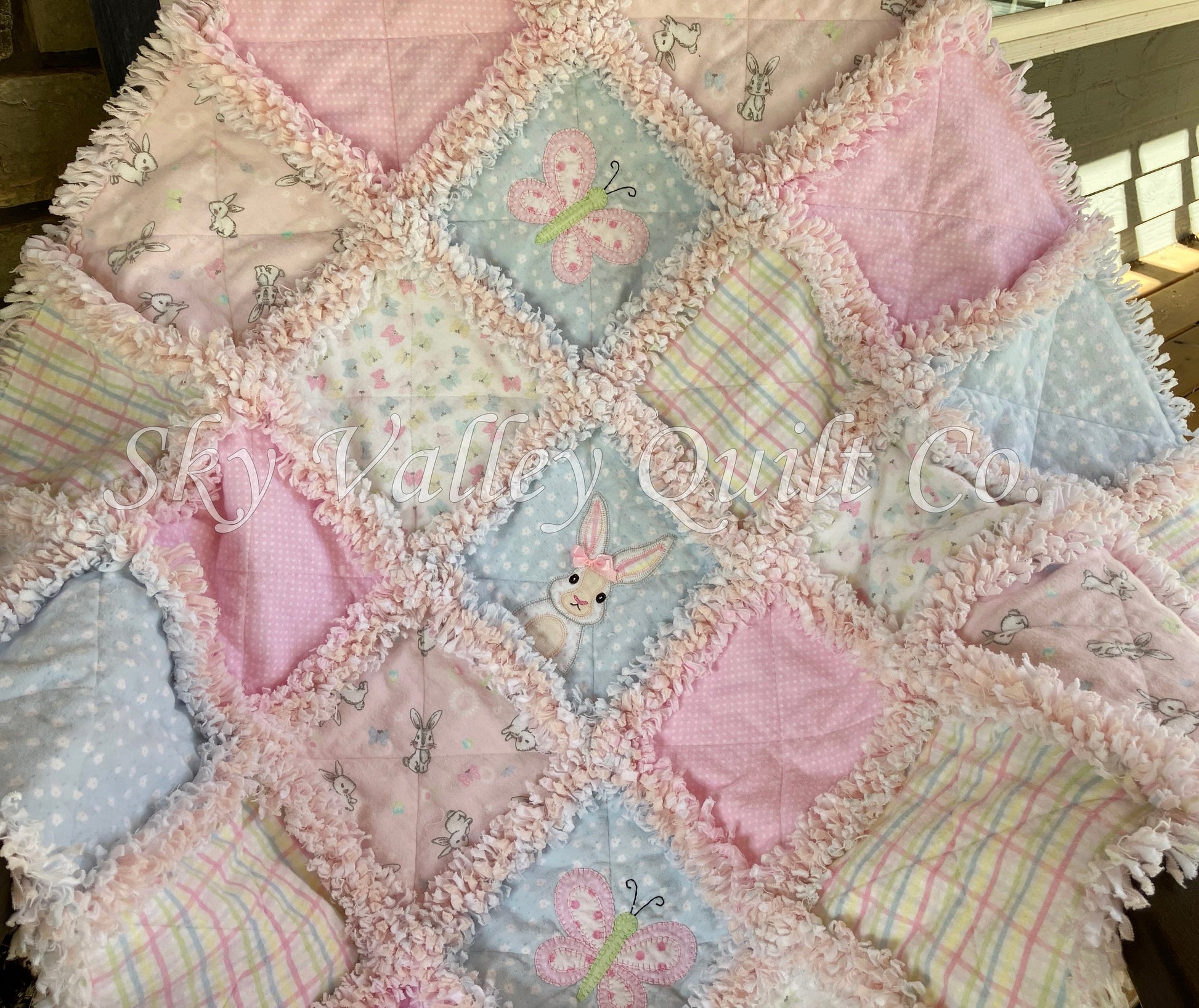Pre cut Rag Quilt KIT-Sweet bunnies and butterflies, traditional Pastel Pink and blue flannel with diecuts!
