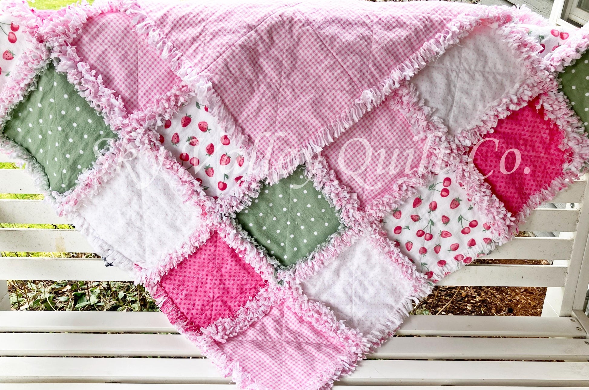 Finished rag quilt - strawberries in pinks and sage green flannels