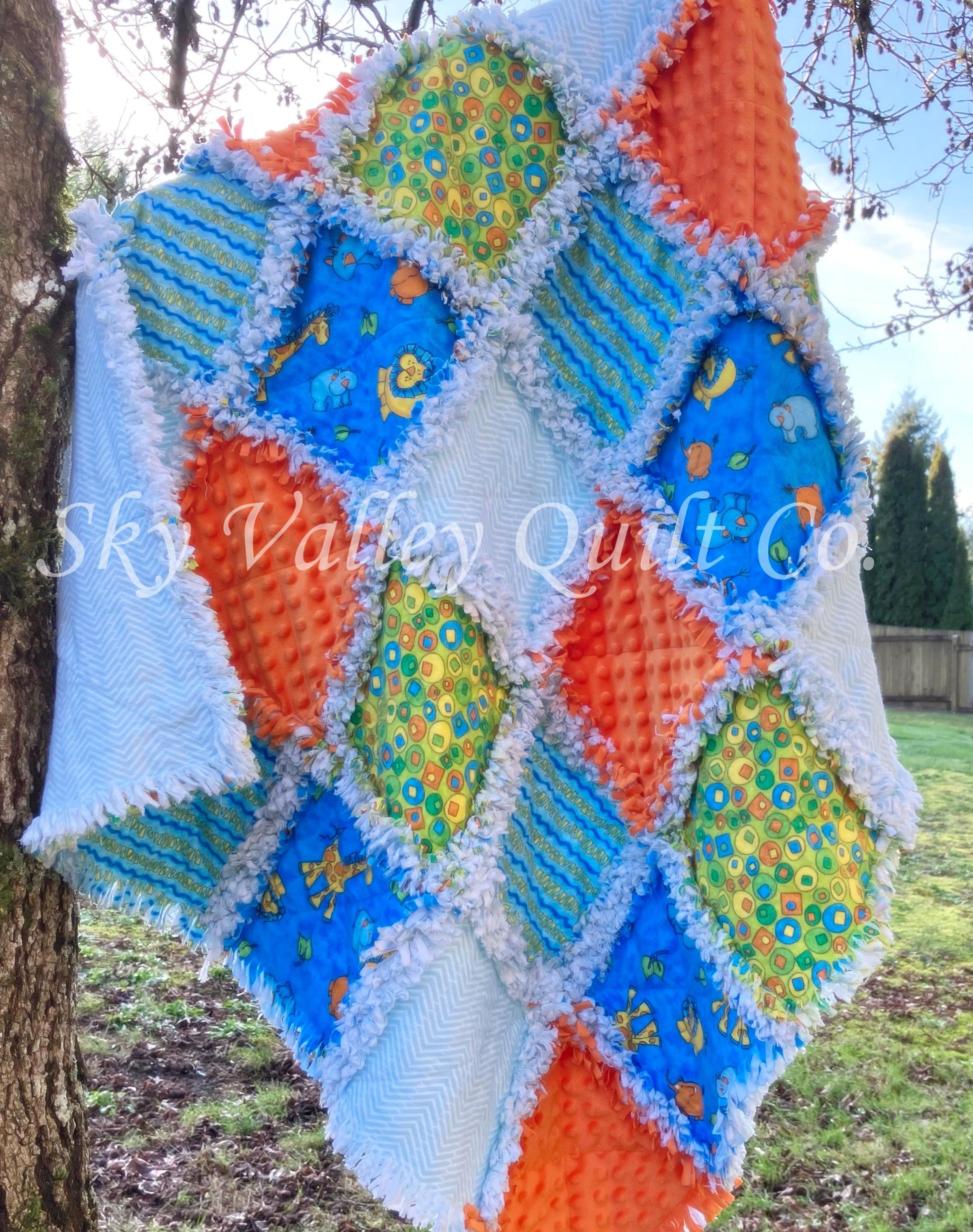 Precut rag quilt KIT ~ bright safari animals blue orange and green flannels