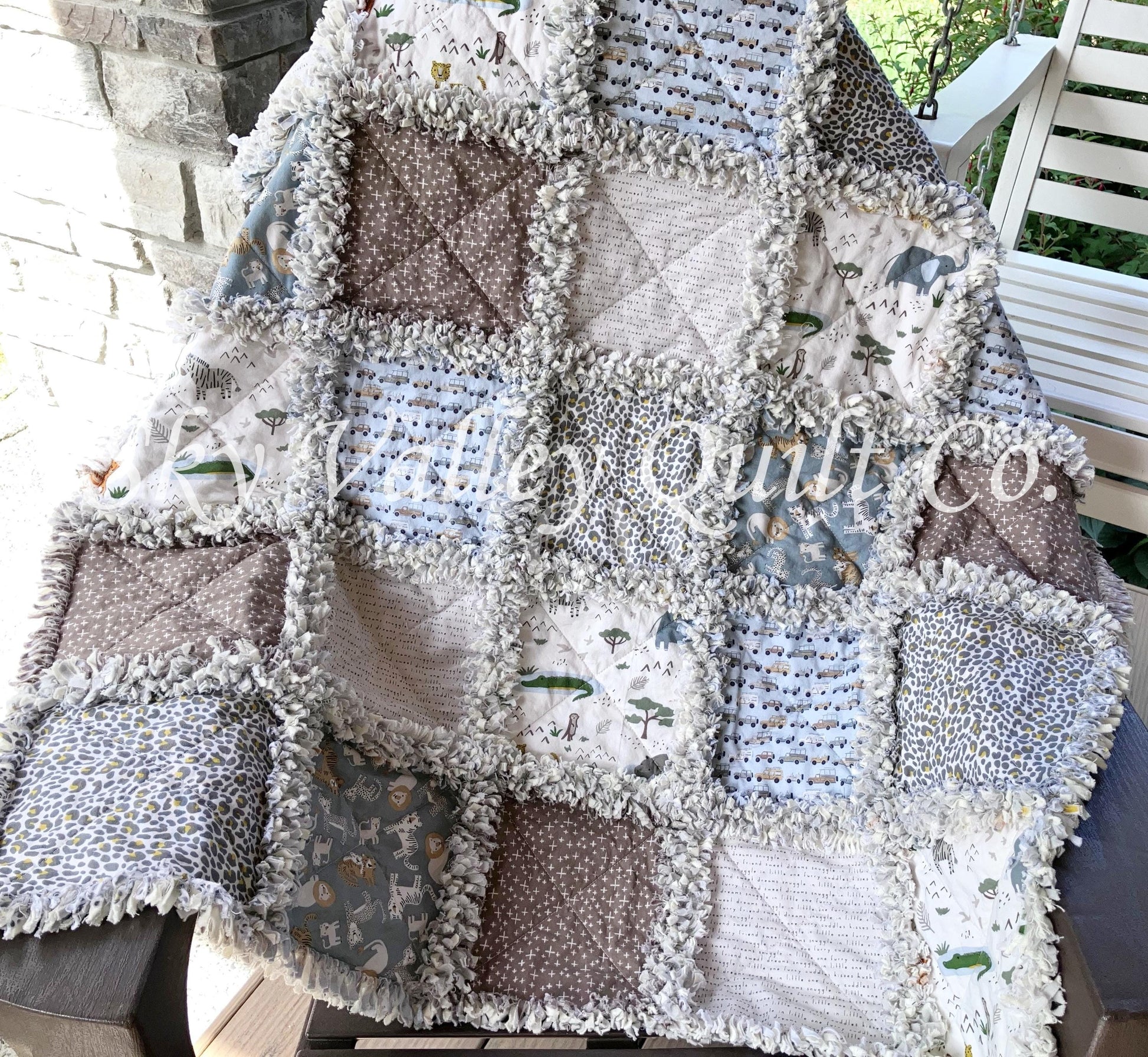 Finished and ready to ship Rag Quilt -Riley Blake Leo and Savannah, safari animals, blue and tan
