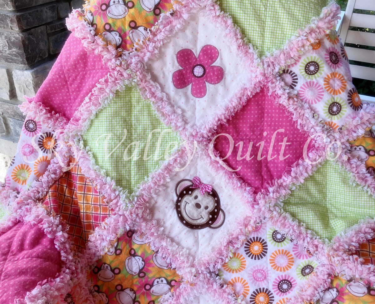 Finished and ready to ship rag quilt -pink and green monkey applique quilt
