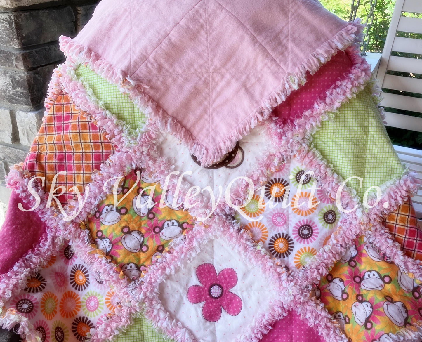 Finished and ready to ship rag quilt -pink and green monkey applique quilt