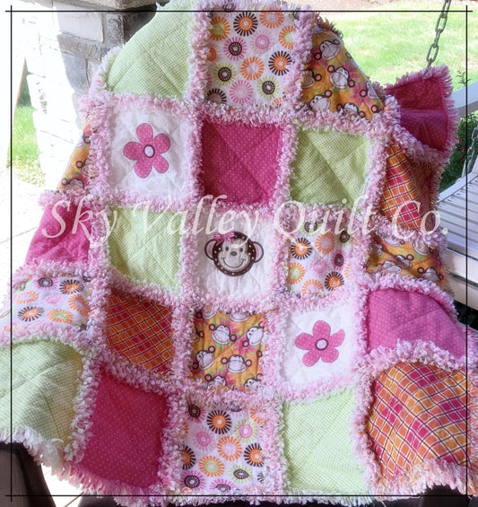 Finished and ready to ship rag quilt -pink and green monkey applique quilt